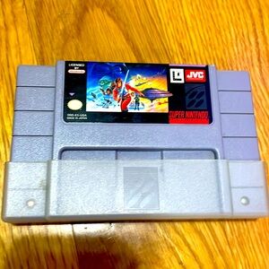 Super Empire Strikes Back Super Nintendo Game and game protector